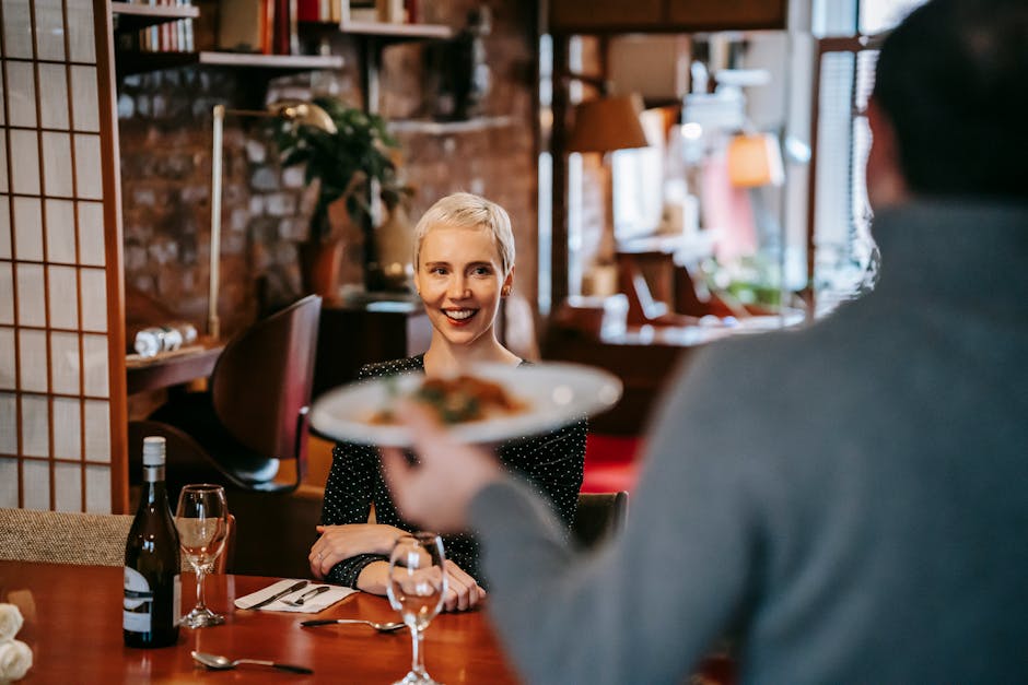 Happy couple enjoying special occasion dining at upscale restaurant
