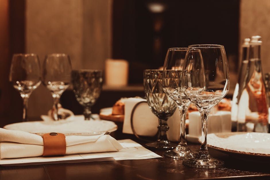 Elegant wedding rehearsal dinner table setting with fine dining atmosphere